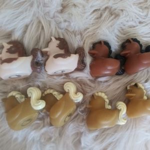 8 rubber horses